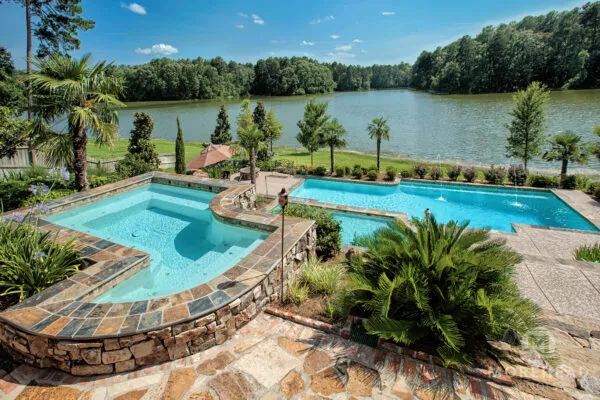 Luxury swimming pool with custom detached home spa