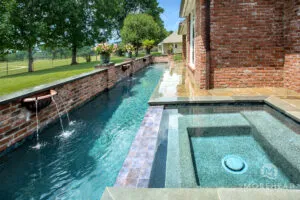 Lap swimming pool with water features