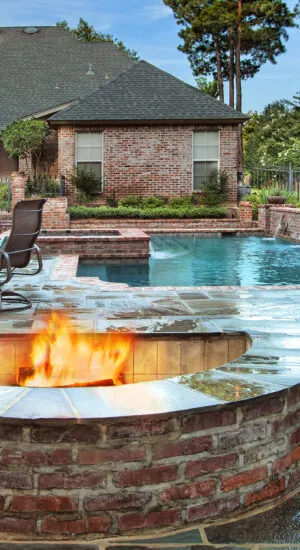 Geometric swimming pool with firepit