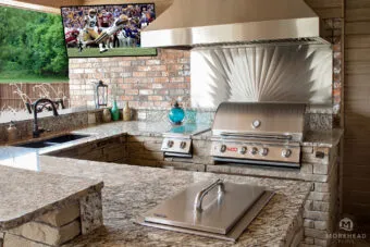 Outdoor kitchen with hi-tech built in appliances