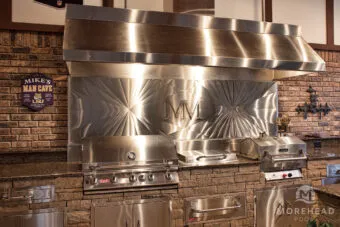 Sheltered outdoor kitchen with full range of built in appliances