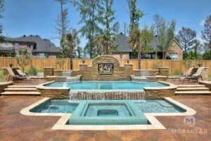 Luxury swimming pool with custom spa, and water features