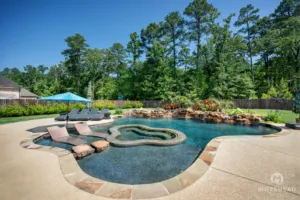 Swimming pool with in-built tanning ledges