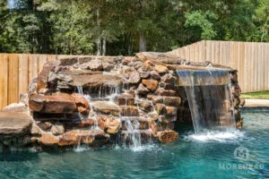 outside photo of stone water feature | Morehead Pools